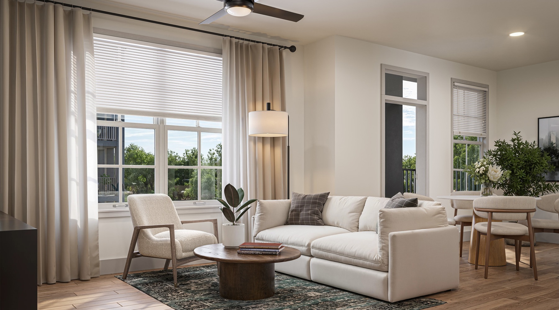 a living room with a fan and a couch