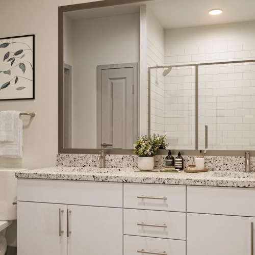 a bathroom with a large mirror