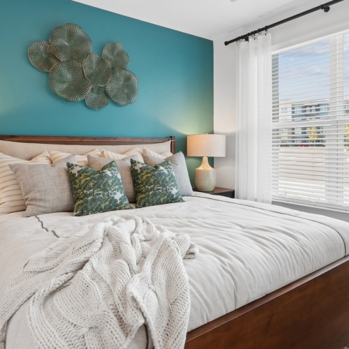 Bedroom with natural lighting and high ceilings