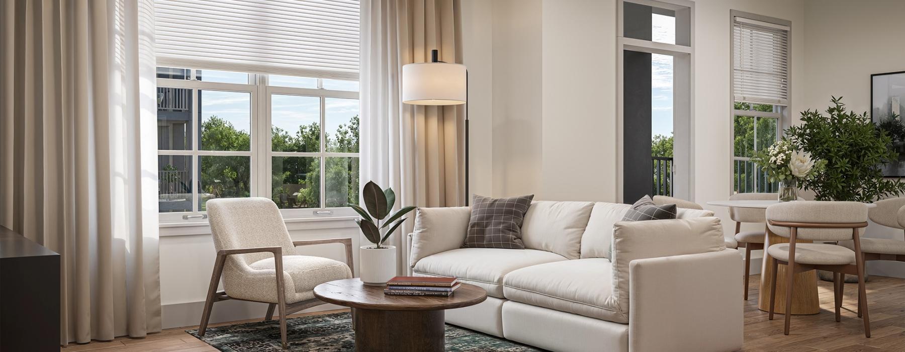 a living room with a fan and a couch